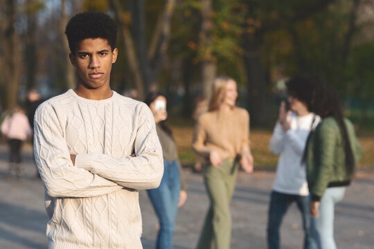 Hold onto toxic relationships Person isolating themselves from a toxic social group