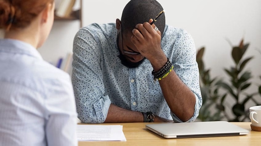 Person preparing mentally before a difficult conversation