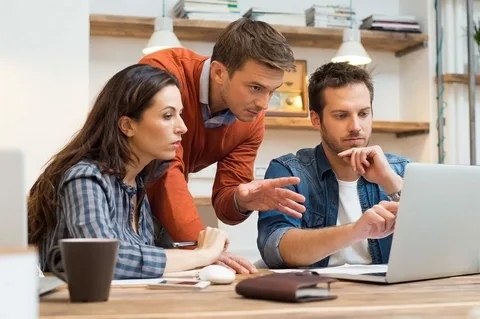 The skill of persuasion A young man convinces others of a particular idea.
