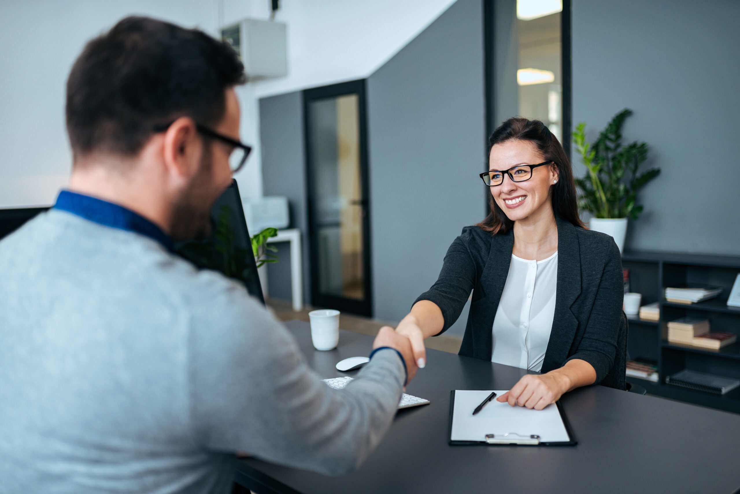 benefits of positive self-talk A confident professional preparing for an interview, representing the benefits of positive self-talk.
